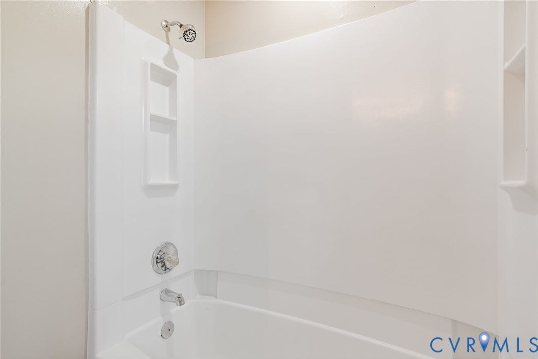 Hall full bathroom with tub/shower combo