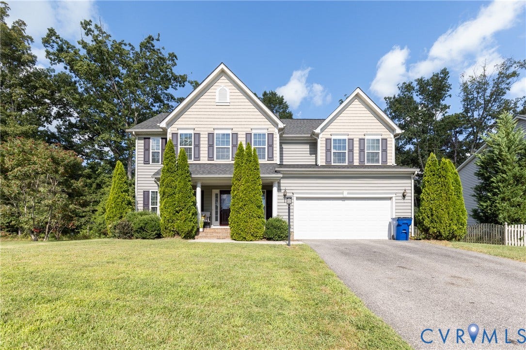 12814 Bailey Hill Court, Bayhill Pointe, Midlothian, VA 23112 Two-story residence with light-colored siding, contrasting dark shutters, and a covered front entry