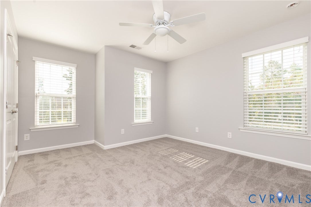 12814 Bailey Hill Court, Bayhill Pointe, Midlothian, VA 23112 Recessed ceiling fan, light gray wall paint, three windows with blinds, white trim, and gray carpet
