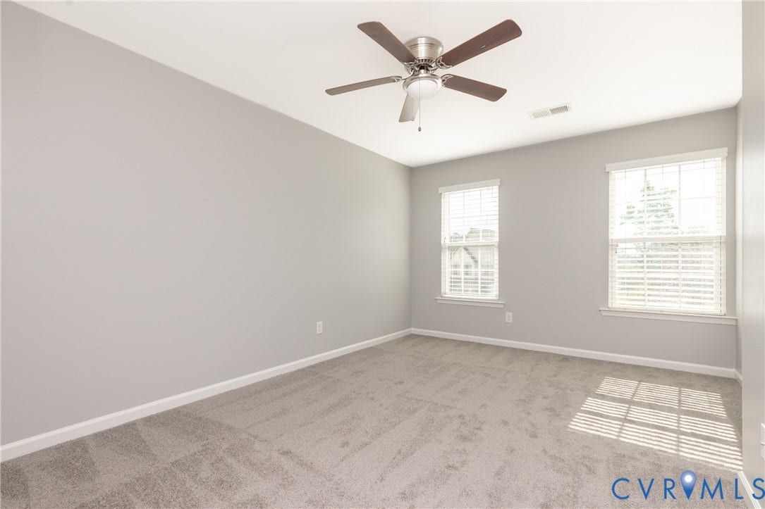 12814 Bailey Hill Court, Bayhill Pointe, Midlothian, VA 23112 Room featuring two windows, neutral gray walls, and gray carpeting