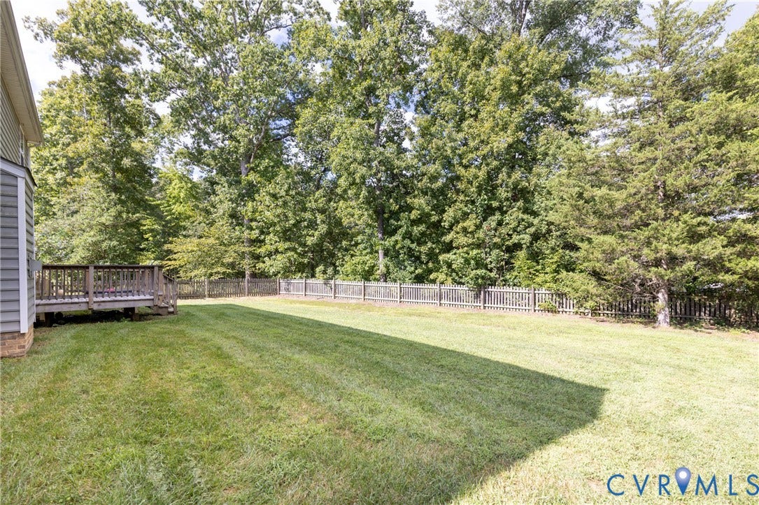 12814 Bailey Hill Court, Bayhill Pointe, Midlothian, VA 23112 Expansive green lawn, wood deck, and wood fence