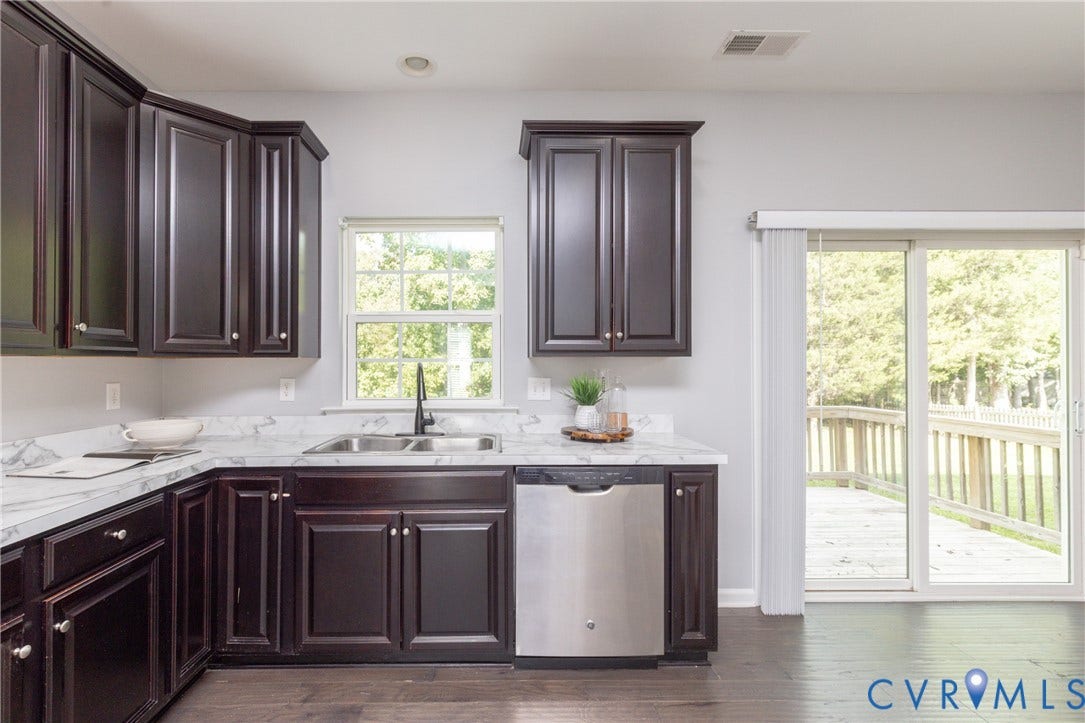 12814 Bailey Hill Court, Bayhill Pointe, Midlothian, VA 23112 Dark wood-finish cabinetry with white hardware