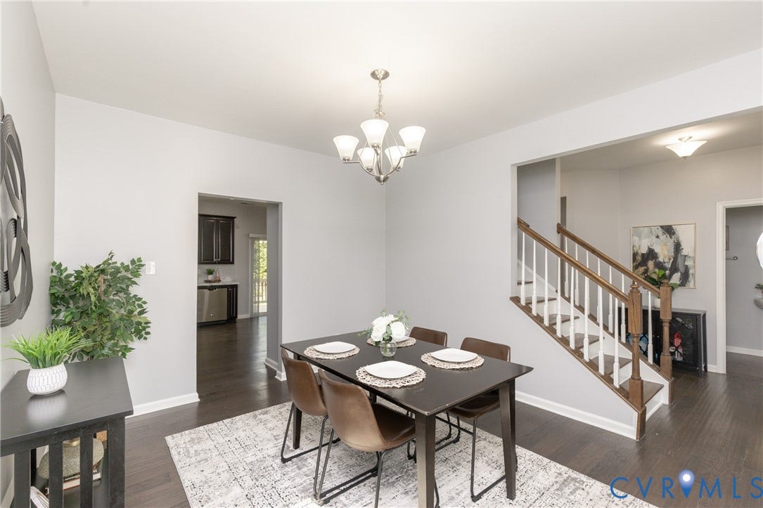 12814 Bailey Hill Court, Bayhill Pointe, Midlothian, VA 23112 Recessed lighting, wood-finish flooring, staircase with wood handrail and white balusters, brushed nickel chandelier, and a built-in wet bar with dark cabinetry