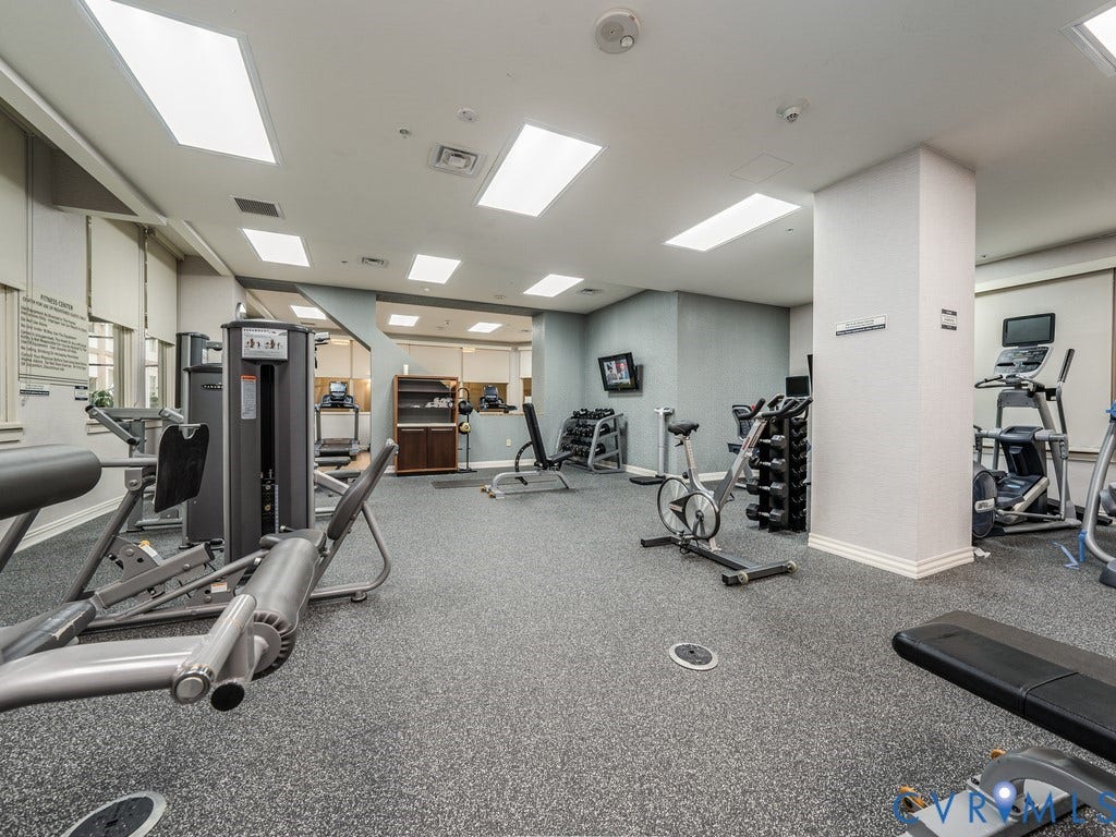 230 N 6th Street, #U325, Richmond, VA 23219 Dedicated fitness center featuring exercise machines, free weights, and integrated televisions