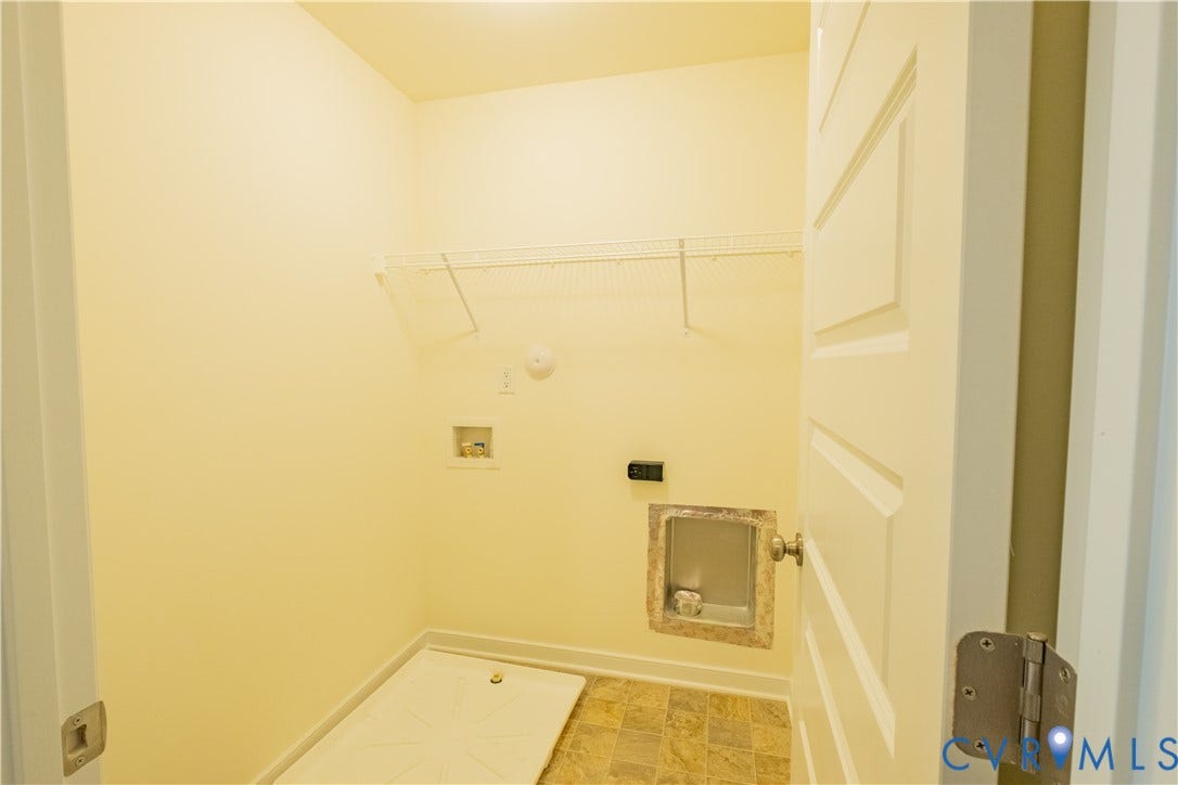 18429 Palisades Court, Chesterfield, VA 23120 Dedicated utility space with wire shelving, wall hookups for appliances, and patterned flooring