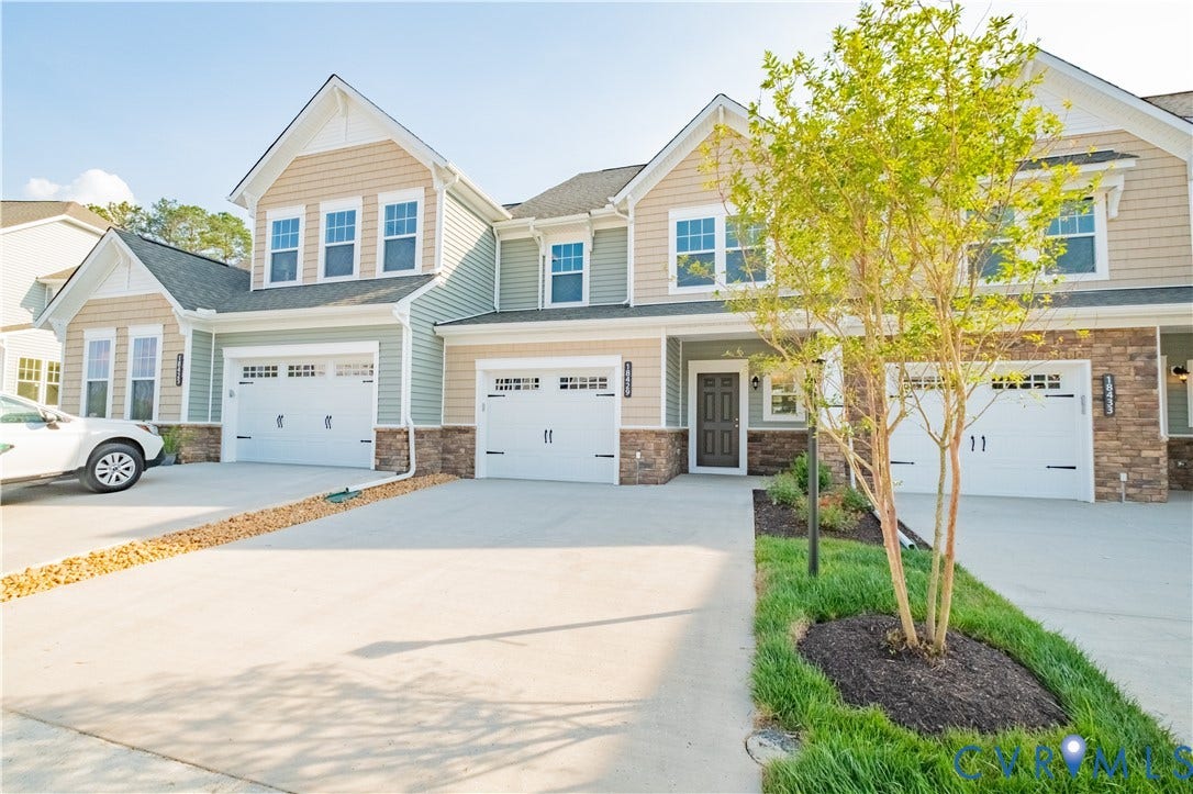 18429 Palisades Court, Chesterfield, VA 23120 Multi-level facade featuring stone accents, light green and tan siding, and white trim