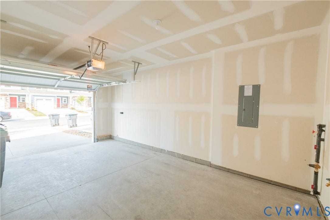 18429 Palisades Court, Chesterfield, VA 23120 Attached garage with concrete flooring, automatic garage door opener, and visible electrical panel