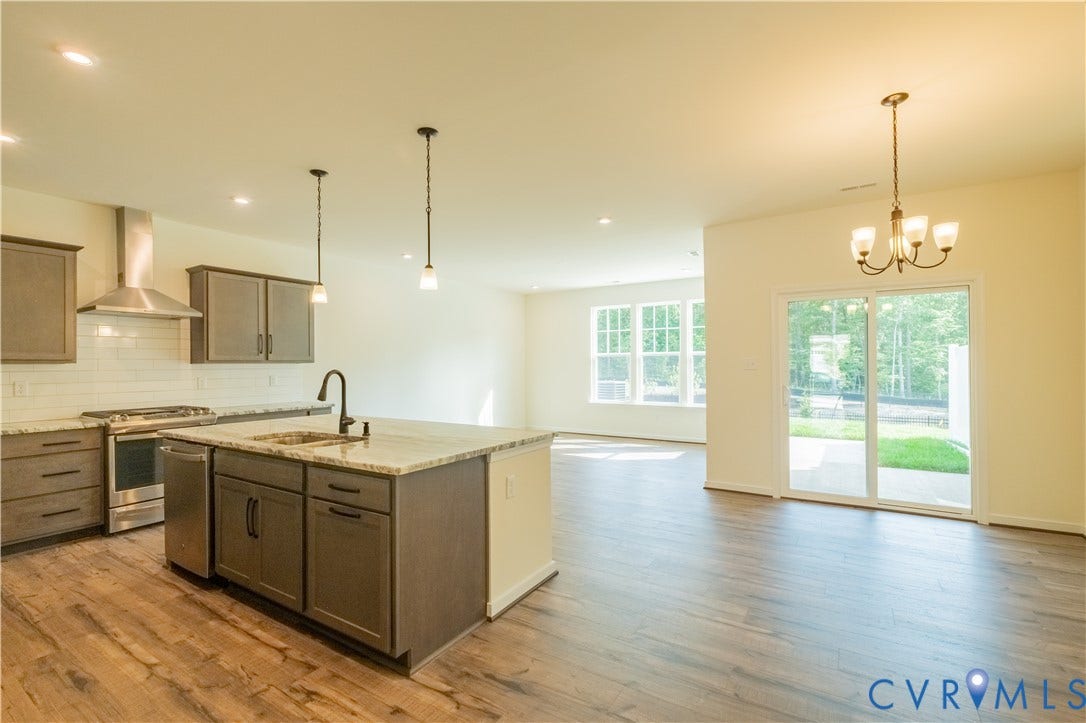 18429 Palisades Court, Chesterfield, VA 23120 Open-concept living space featuring wood-finish flooring