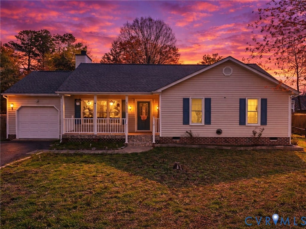7323 Pineleaf Drive, Chesterfield, VA 23234 Ranch-style residence featuring light-colored siding, a dark asphalt shingle roof, and a front-facing garage with a white door