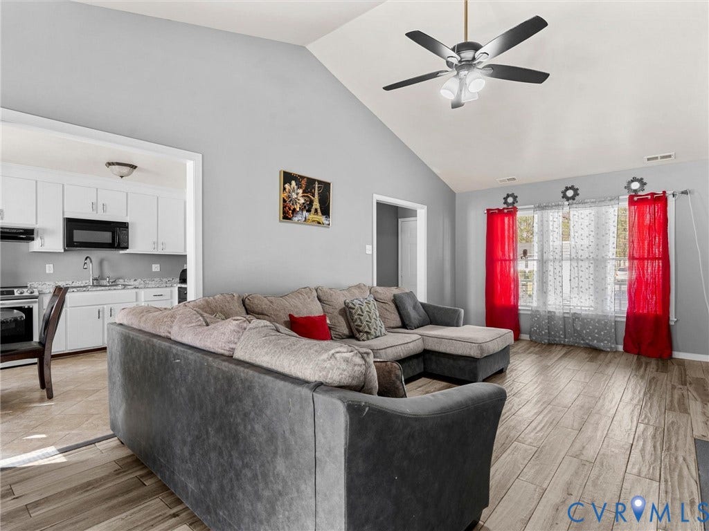 7323 Pineleaf Drive, Chesterfield, VA 23234 Vaulted ceiling with an attached ceiling fan and light fixture