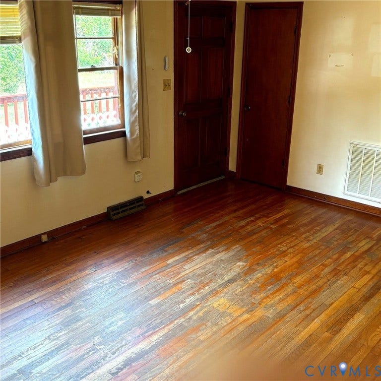 Wood floors, closet, picture window