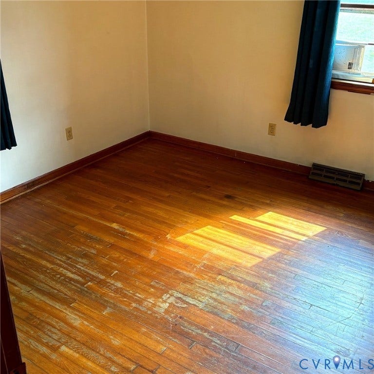 Hardwood flooring in a neutral-toned room