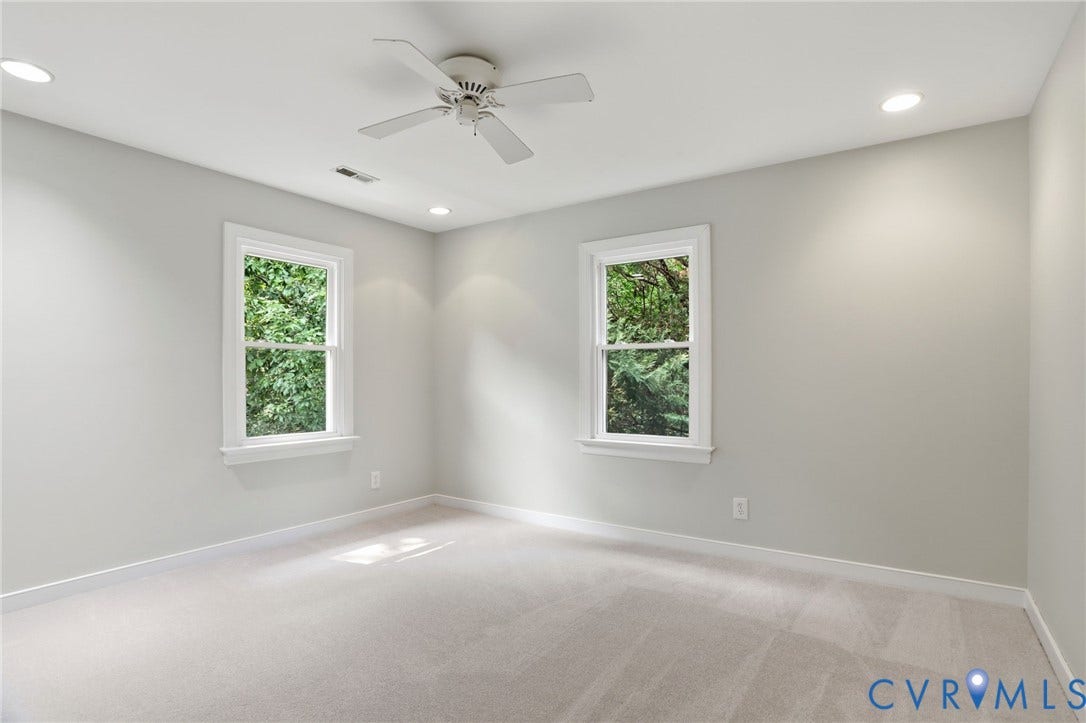 2904 Old Gun Rd W, Old Gun, Midlothian, VA 23113 Carpeted room featuring two white-framed windows, a ceiling fan, and recessed lighting