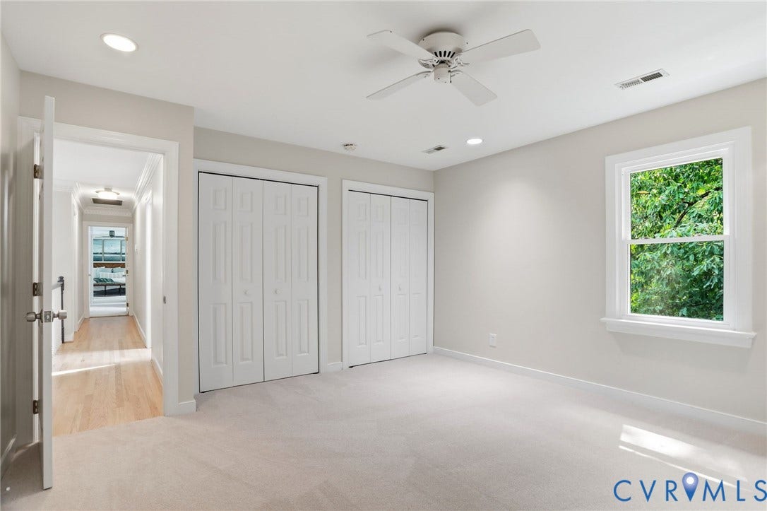 2904 Old Gun Rd W, Old Gun, Midlothian, VA 23113 Carpeted room with a ceiling fan, recessed lighting, and a window framing lush greenery