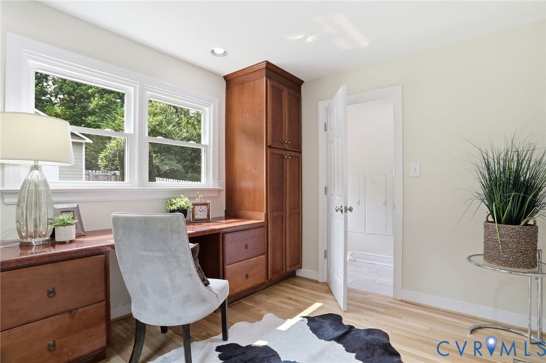 2904 Old Gun Rd W, Old Gun, Midlothian, VA 23113 Hardwood flooring complements a built-in wooden desk and cabinetry