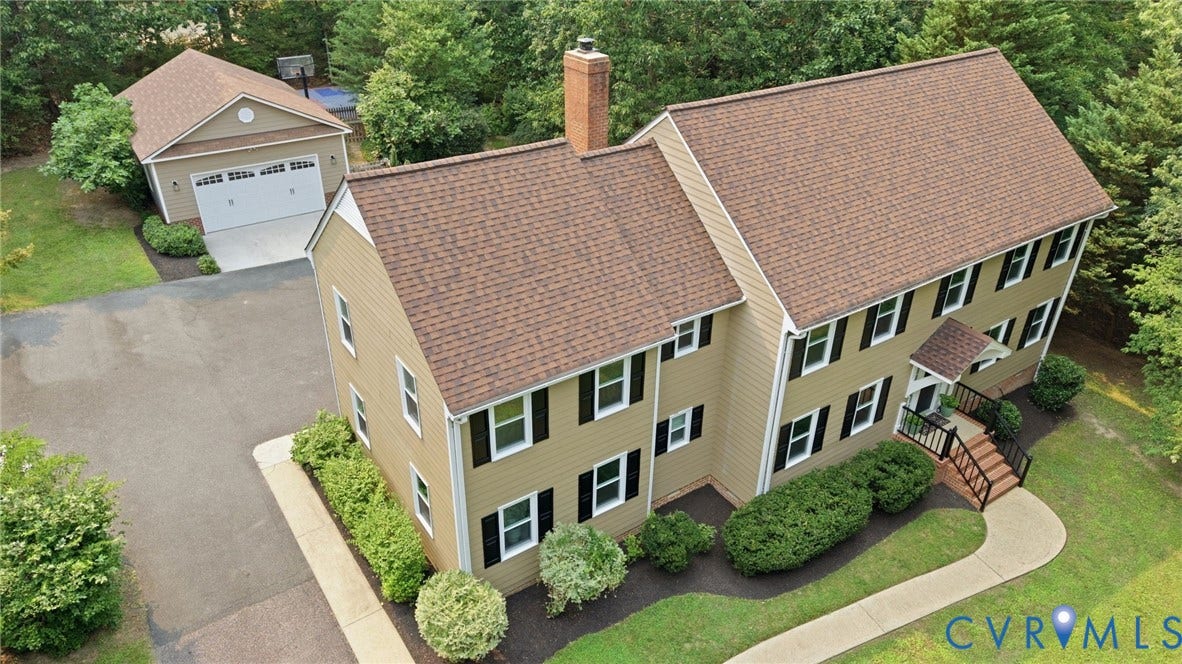 2904 Old Gun Rd W, Old Gun, Midlothian, VA 23113 Two-story residence featuring light brown siding and a brown shingle roof