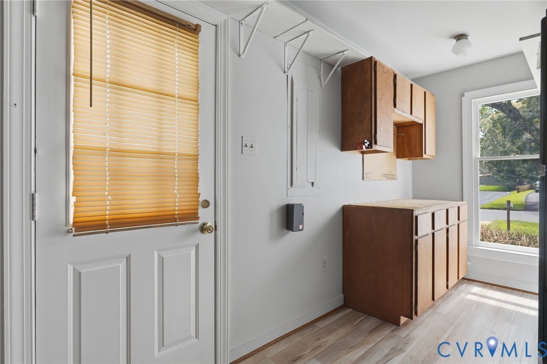 Spacious laundry/utility room with washer and dryer hookups and a convenient exterior entrance