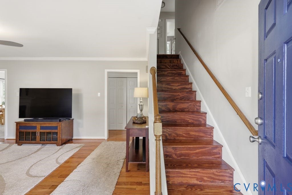 9437 Willow Ridge Drive, Glen Allen, VA 23060 Wood-finish flooring throughout, with a rich wood staircase and handrail