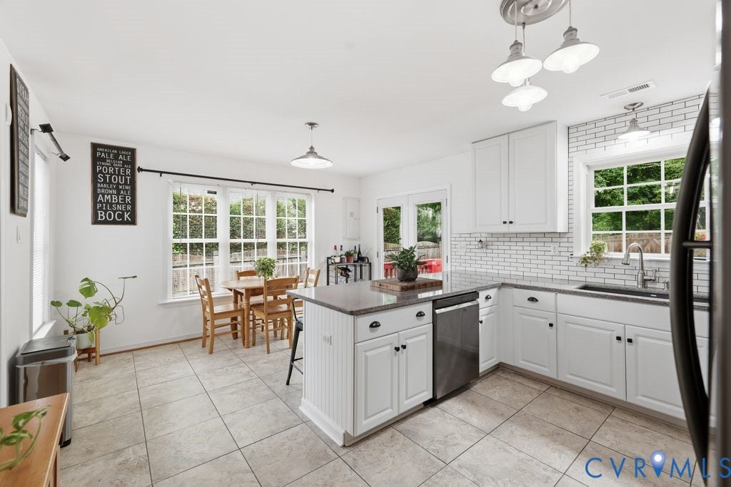 9437 Willow Ridge Drive, Glen Allen, VA 23060 Kitchen featuring white cabinetry, subway tile backsplash, stainless steel dishwasher, and tiled flooring