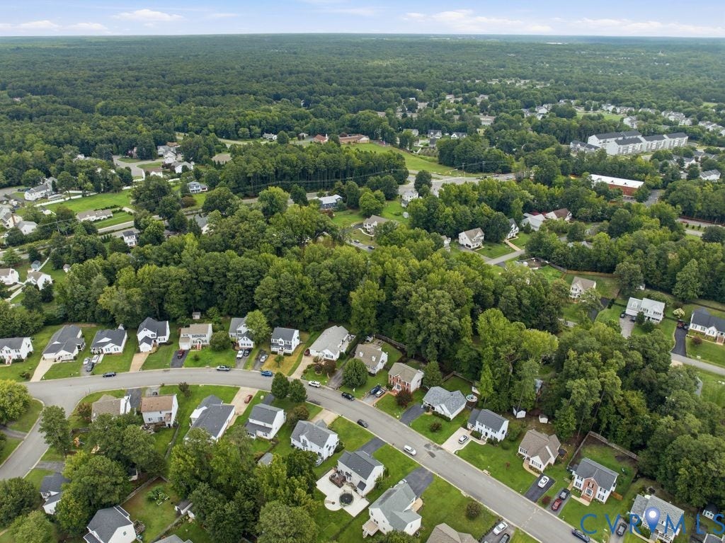 9437 Willow Ridge Drive, Glen Allen, VA 23060 Residential area with extensive tree coverage and a mix of single-family homes