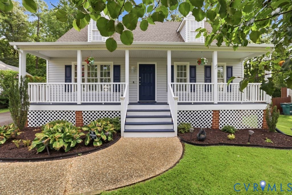 9437 Willow Ridge Drive, Glen Allen, VA 23060 Covered front porch, white siding, dark blue shutters, dormer window, gravel pathway