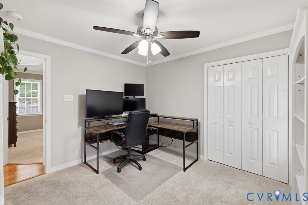 9437 Willow Ridge Drive, Glen Allen, VA 23060 Ceiling fan with integrated lighting, crown molding, light-toned wall paint, carpeted flooring, and built-in shelving