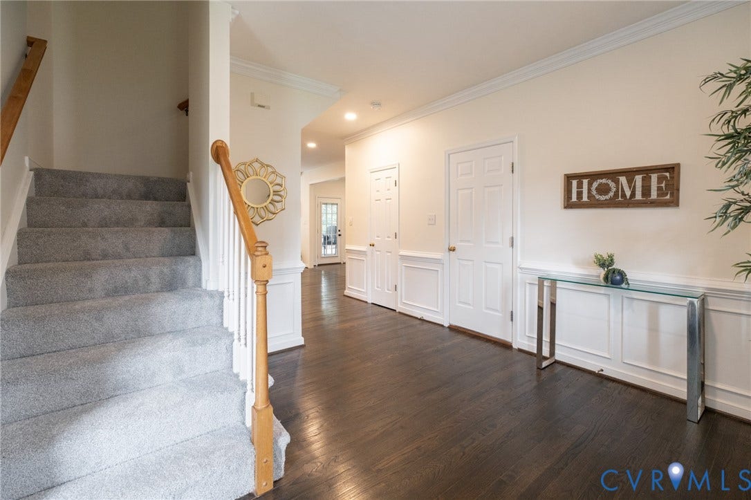 4805 Saddleridge Court, Saddleridge At Twin Hickory, Glen Allen, VA 23059 Spacious foyer with dark wood flooring, wainscoting, and crown molding