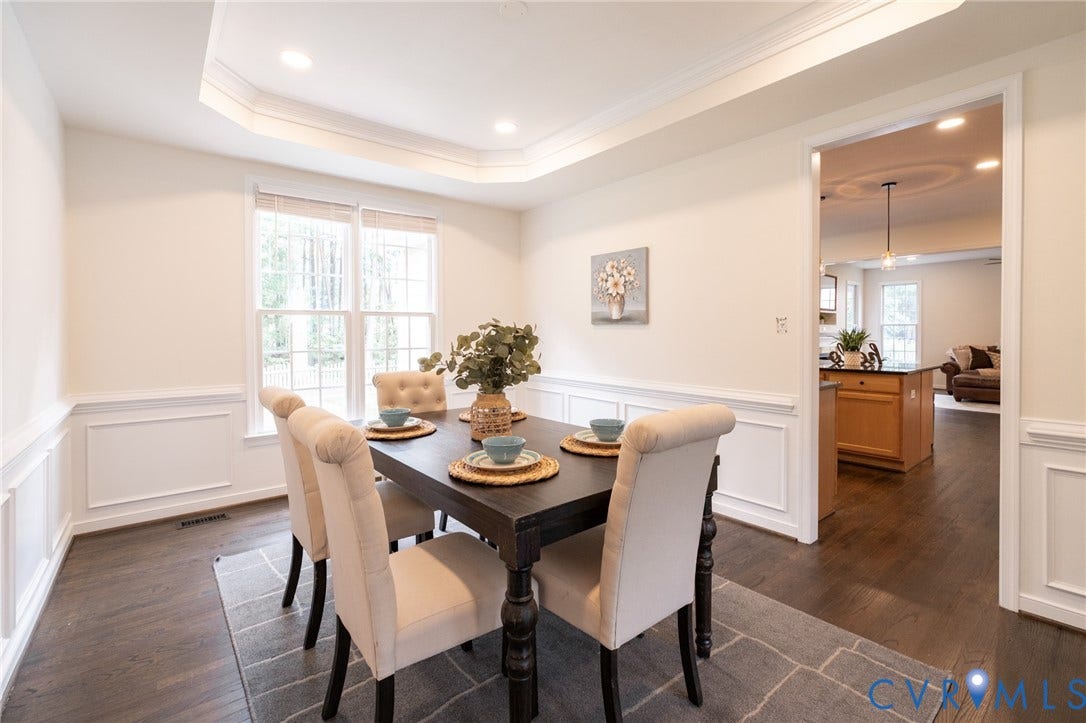 4805 Saddleridge Court, Saddleridge At Twin Hickory, Glen Allen, VA 23059 Formal dining room featuring dark wood-finish flooring and extensive wainscoting