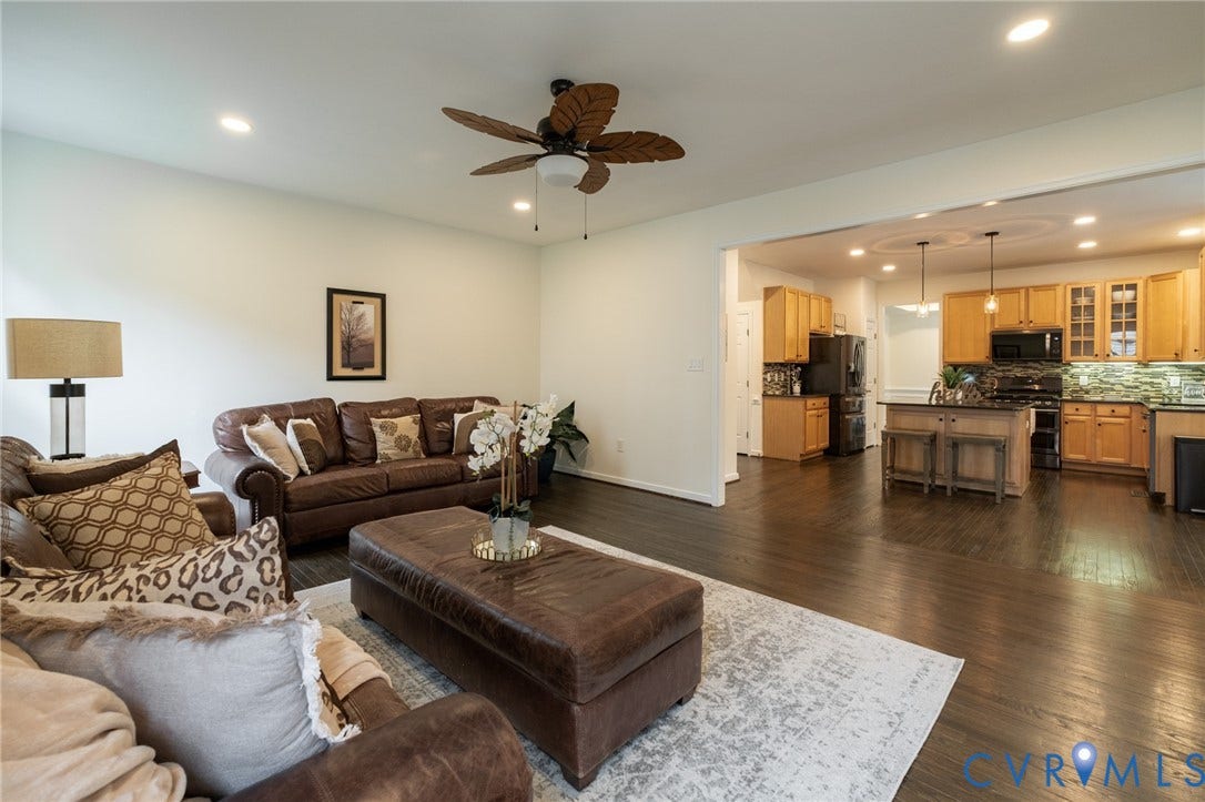 4805 Saddleridge Court, Saddleridge At Twin Hickory, Glen Allen, VA 23059 Open-concept living space featuring dark wood flooring throughout
