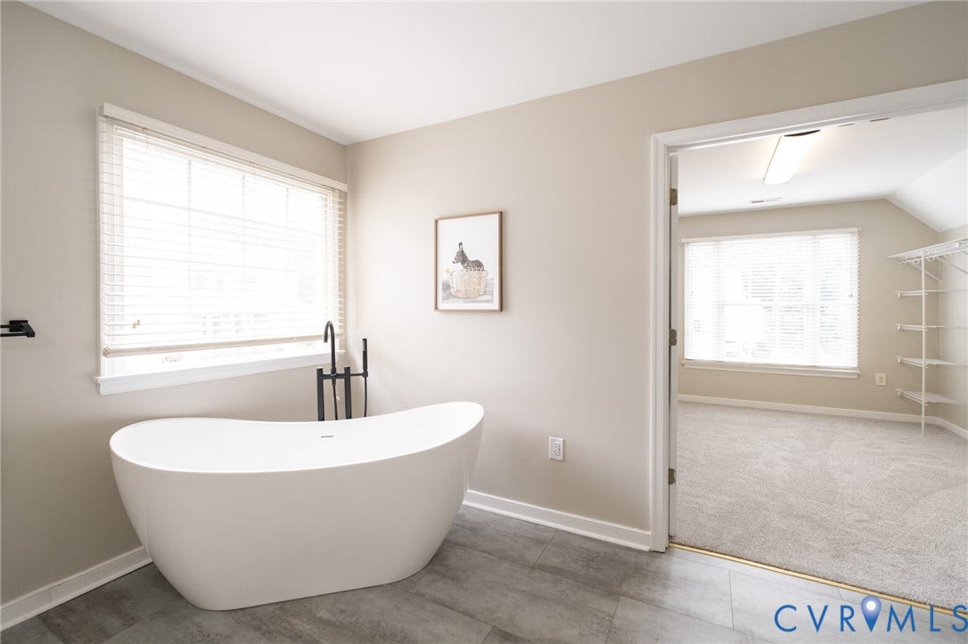 4805 Saddleridge Court, Saddleridge At Twin Hickory, Glen Allen, VA 23059 Freestanding soaking tub with floor-mounted matte black fixtures