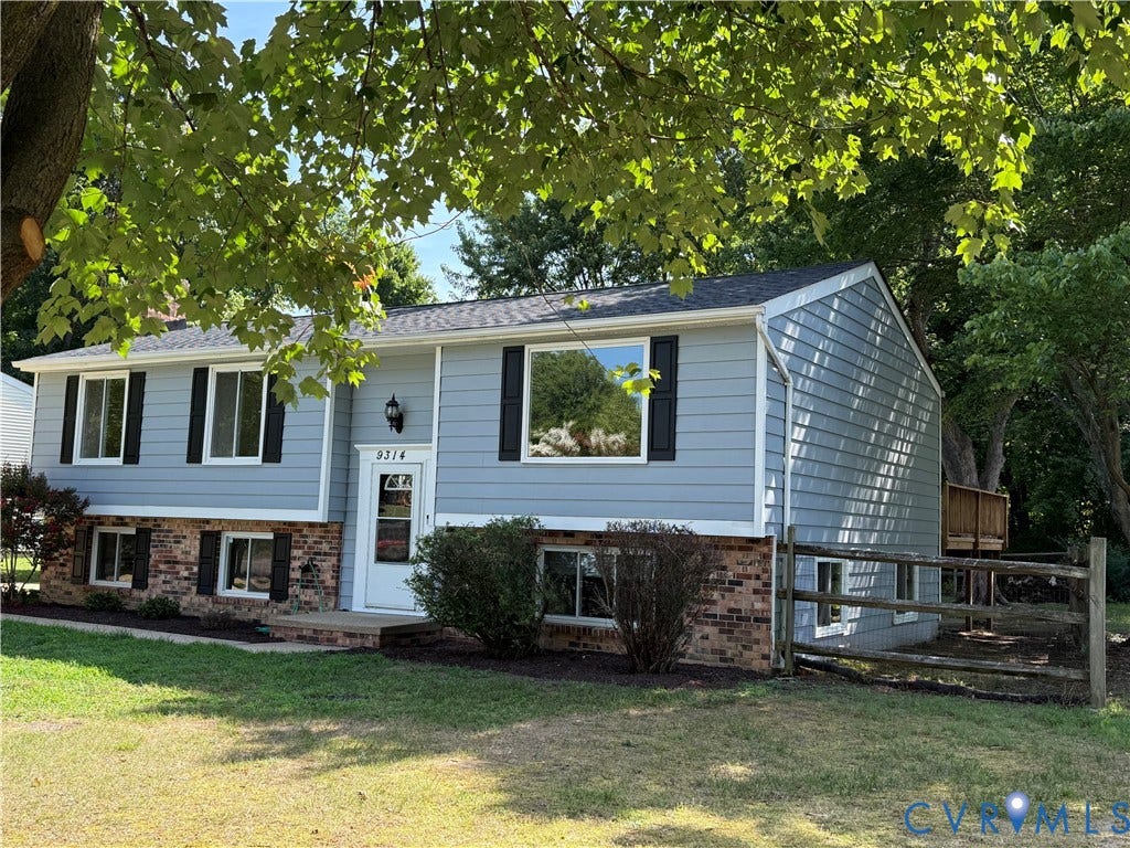 9314 Dolmen Road, Glen Allen, VA 23060 Split-level residence featuring light blue siding with contrasting black window shutters, a brick foundation, and a front entry with a transom window