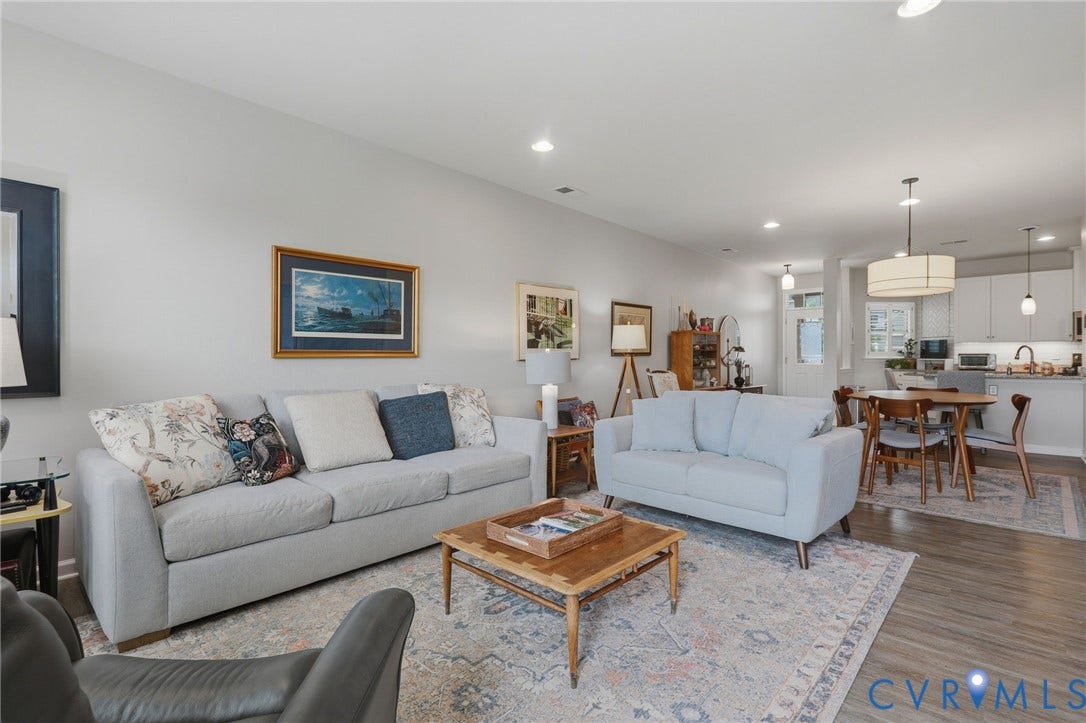10653 Braden Parke Drive, Midlothian, VA 23832 Open-concept living area with wood-finish flooring, recessed lighting, and a neutral color palette
