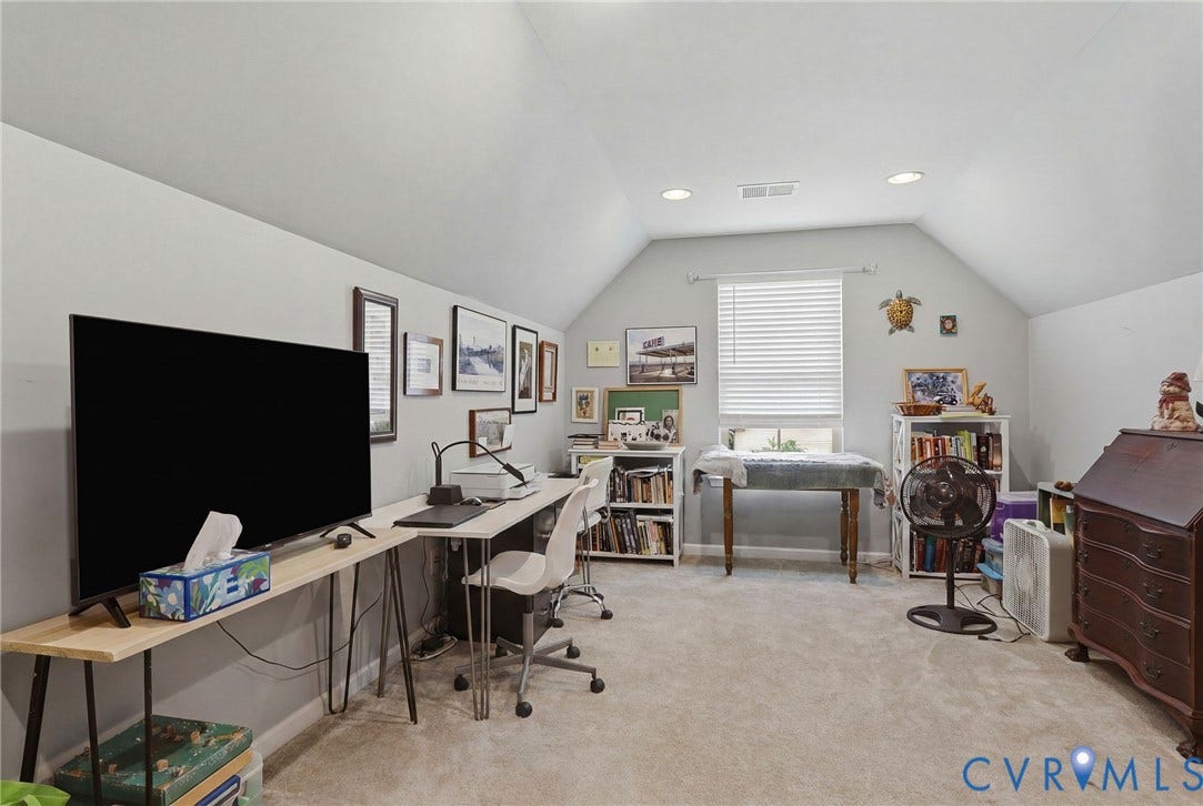10653 Braden Parke Drive, Midlothian, VA 23832 Spacious room featuring vaulted ceilings, recessed lighting, and light-toned carpeting