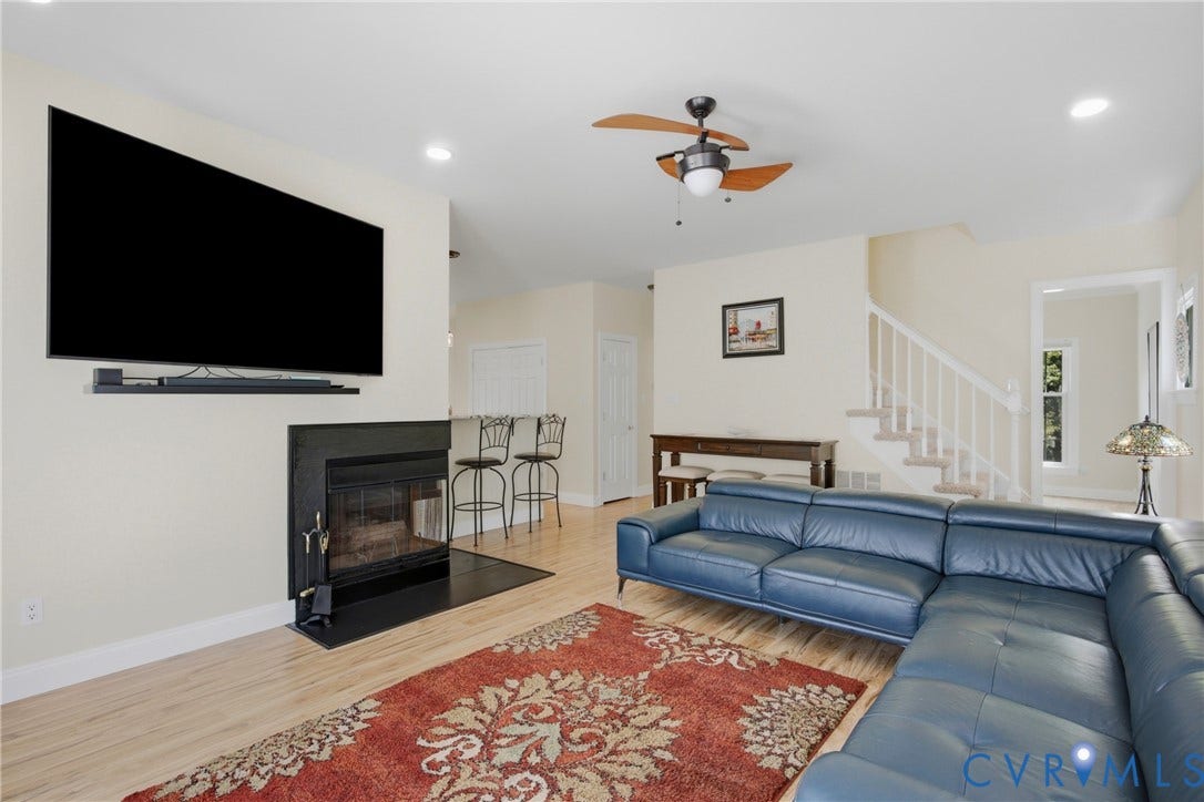 6212 Winsted Court, Wyndham, Glen Allen, VA 23059 The Family Room, updated laminate flooring, ceiling fan and recessed lighting