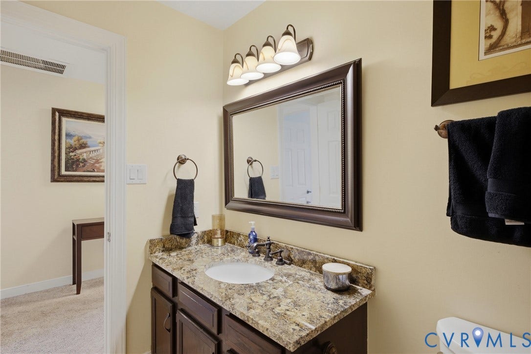 6212 Winsted Court, Wyndham, Glen Allen, VA 23059 Hall Bath featuring Granite Counter Tops and a Travertine Tile Floor