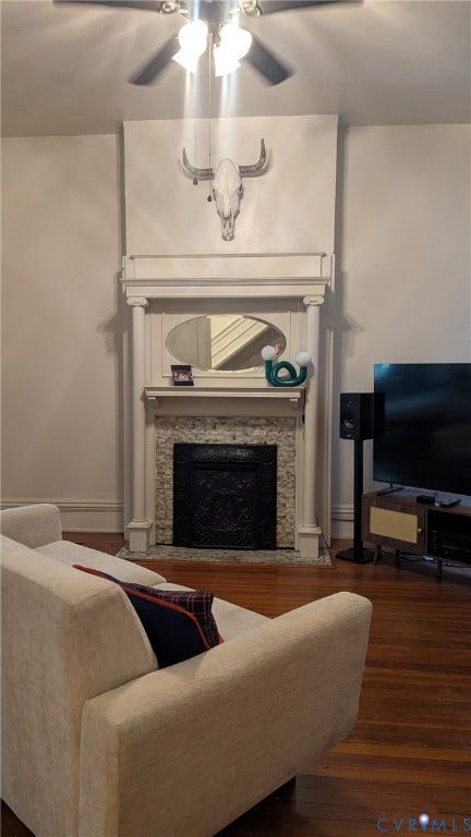 1620 Grove Avenue, #1, Richmond, VA 23220 Ornate fireplace with white mantelpiece, marble-look surround, and cast iron firebox