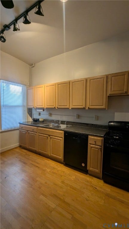1620 Grove Avenue, #1, Richmond, VA 23220 Kitchen featuring wood-finish flooring, light-toned cabinetry, dark countertops, a double basin sink, and black appliances