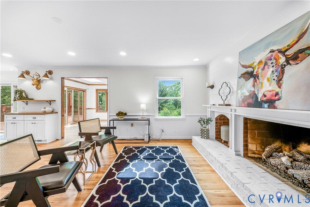Family Room with Fireplace and open to the kitchen.