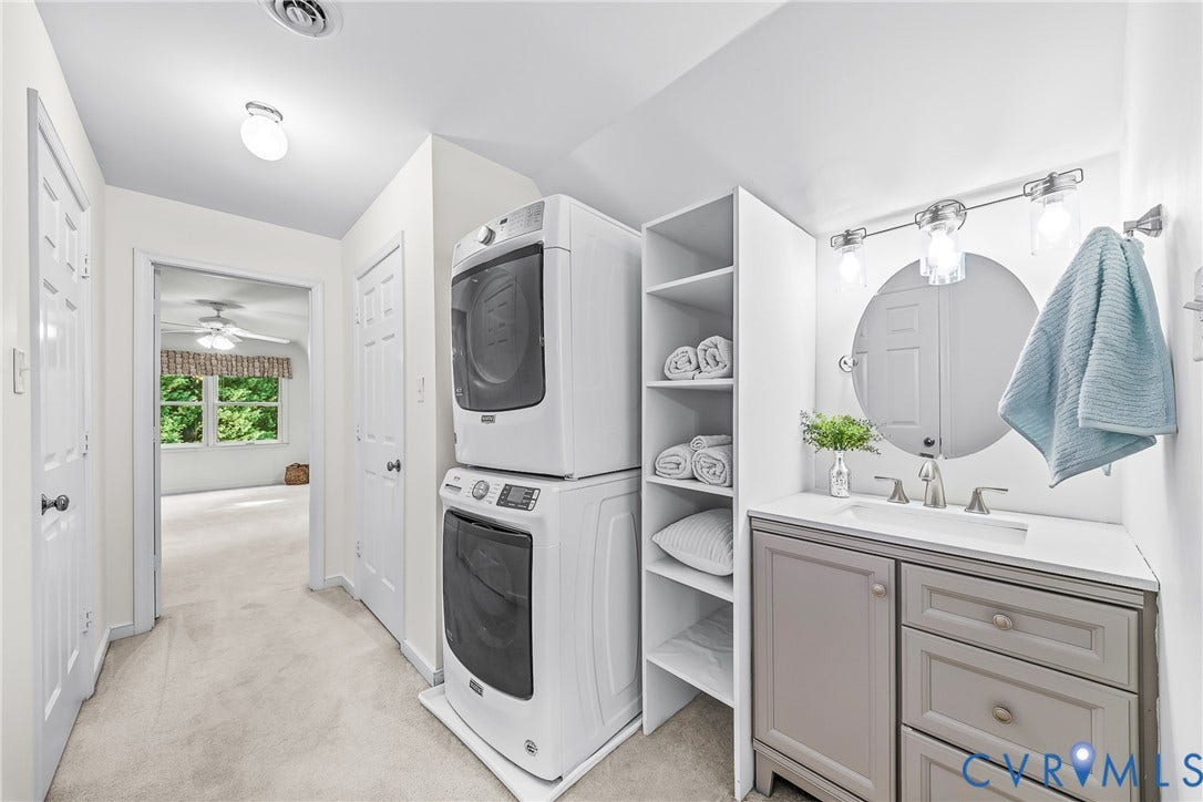 Laundry Area, 3 closets and bathroom vanity.