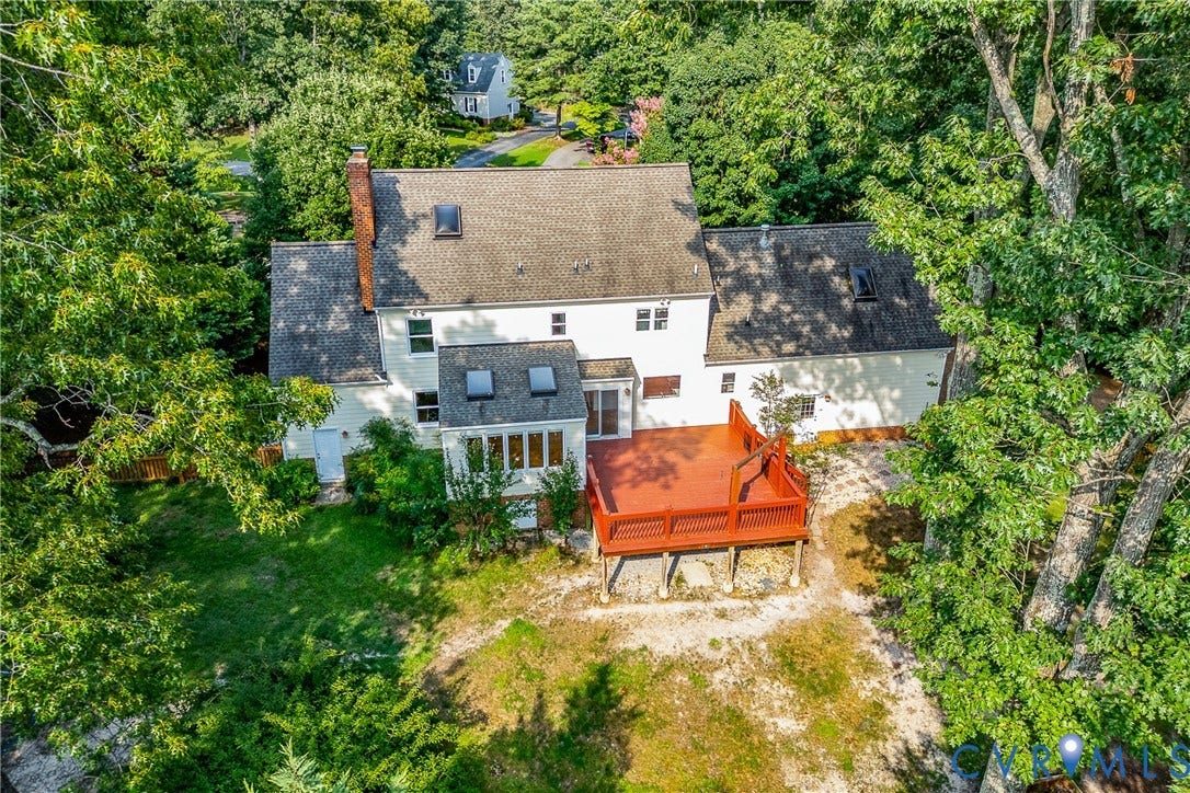 Large Deck over looking .61 acre lot in a cul-de-sac.