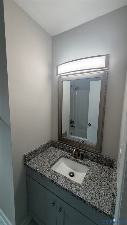 207 Mac Arthur Avenue, Gregory, Colonial Heights, VA 23834 Bathroom vanity featuring a speckled countertop, undermount sink, and brushed nickel faucet
