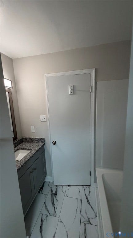 207 Mac Arthur Avenue, Gregory, Colonial Heights, VA 23834 Bathroom featuring a gray vanity with a stone countertop, an integrated sink, and a white subway tile surround bathtub