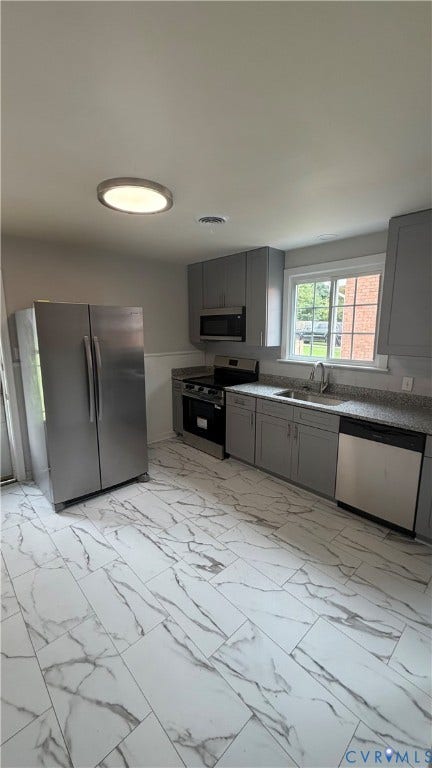 207 Mac Arthur Avenue, Gregory, Colonial Heights, VA 23834 Kitchen featuring new stainless-steel appliances, gray cabinetry, granite-finish countertops, and large format tile flooring