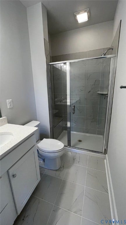 Master Bathroom with vanity, toilet, and a shower with shower door