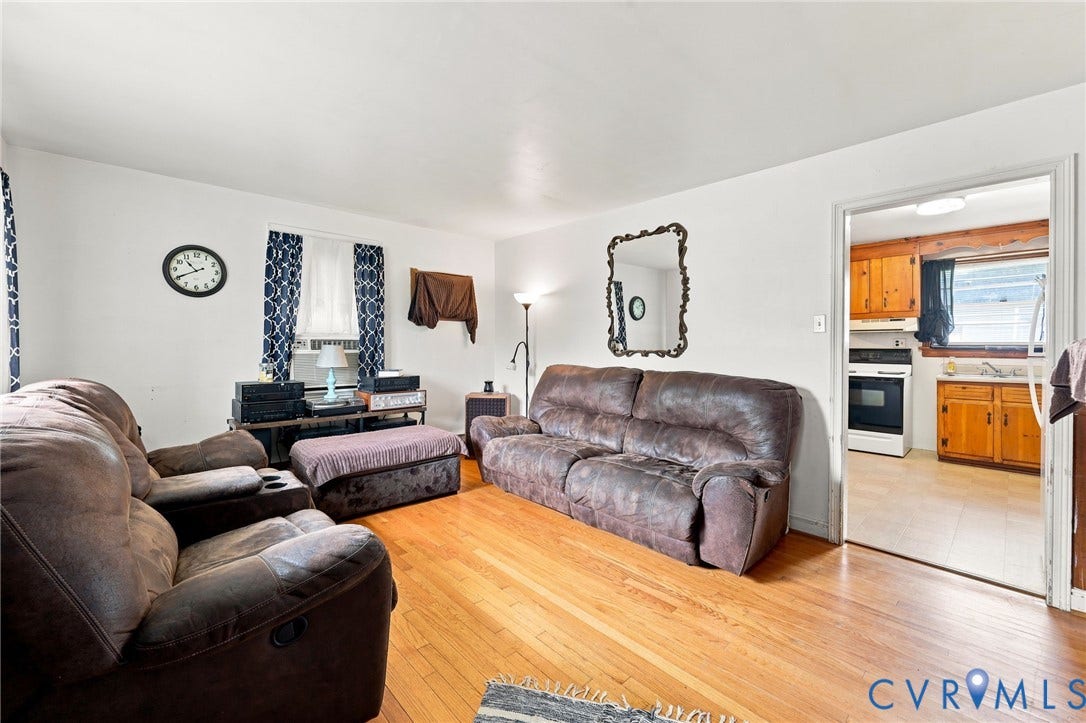 Spacious interior with natural wood flooring
