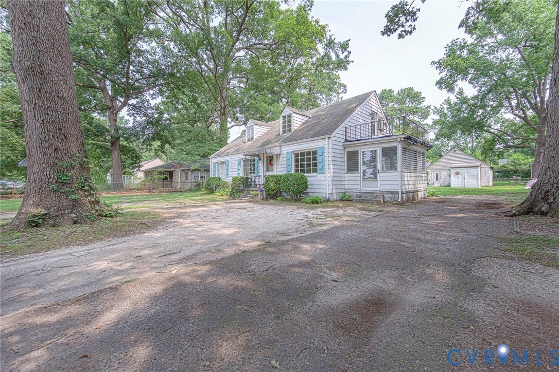 1804 Brentwood Road, Henrico, VA 23222 Side View Subject with unpaved Driveway
