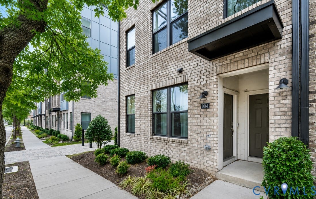 1041 N Lombardy Street, #A, Carver Square, Richmond, VA 23220 Contemporary townhome exterior featuring light-colored brick facade