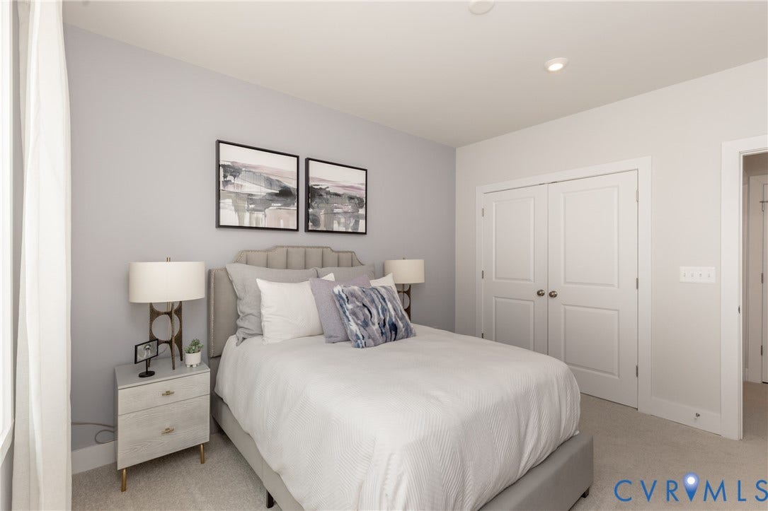 1041 N Lombardy Street, #A, Carver Square, Richmond, VA 23220 Bedroom featuring light gray wall paint, light-colored carpeting, a double-door closet
