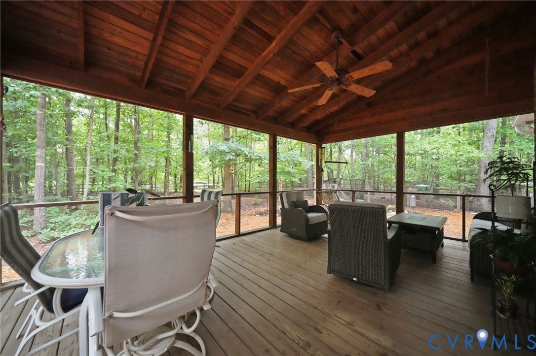 1902 Soldiers Lane, Crozier, VA 23039 Expansive screened porch featuring a vaulted wood-paneled ceiling, wood-finish flooring, and a ceiling fan
