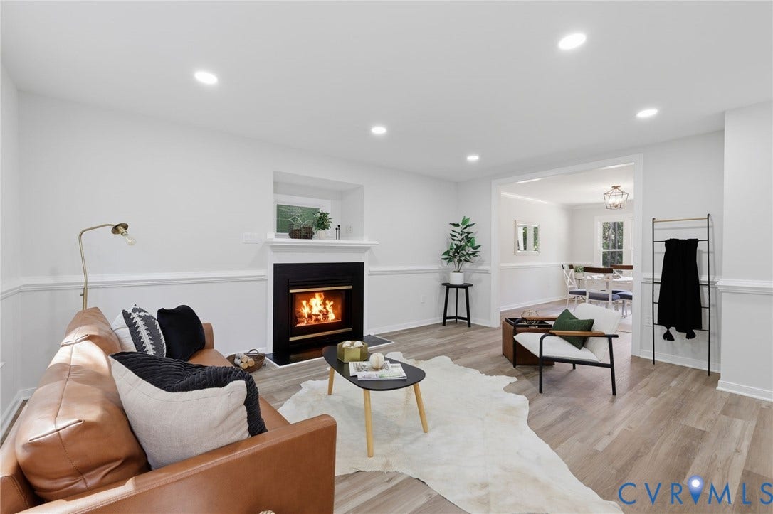 3457 Richards Run, Very Desirable!, Powhatan, VA 23139 Living area featuring a black fireplace with a white mantel, recessed lighting, and wood-finish flooring
